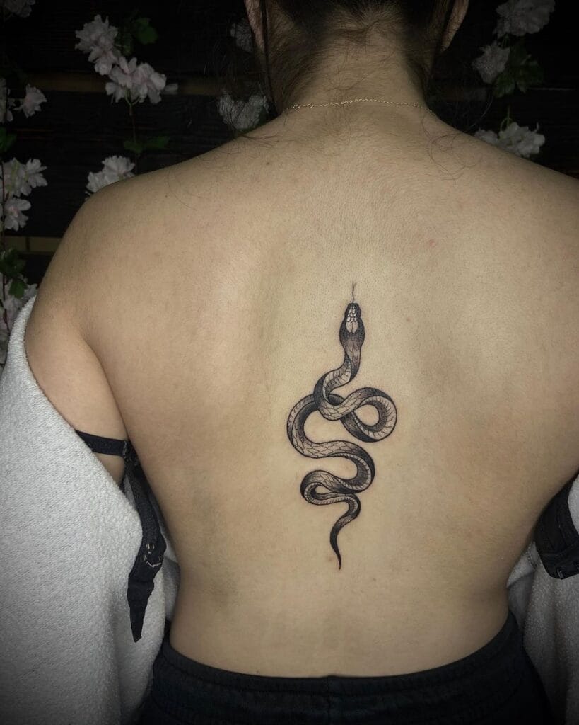 25 Stunning Spine Tattoos For Women That Tell A Story