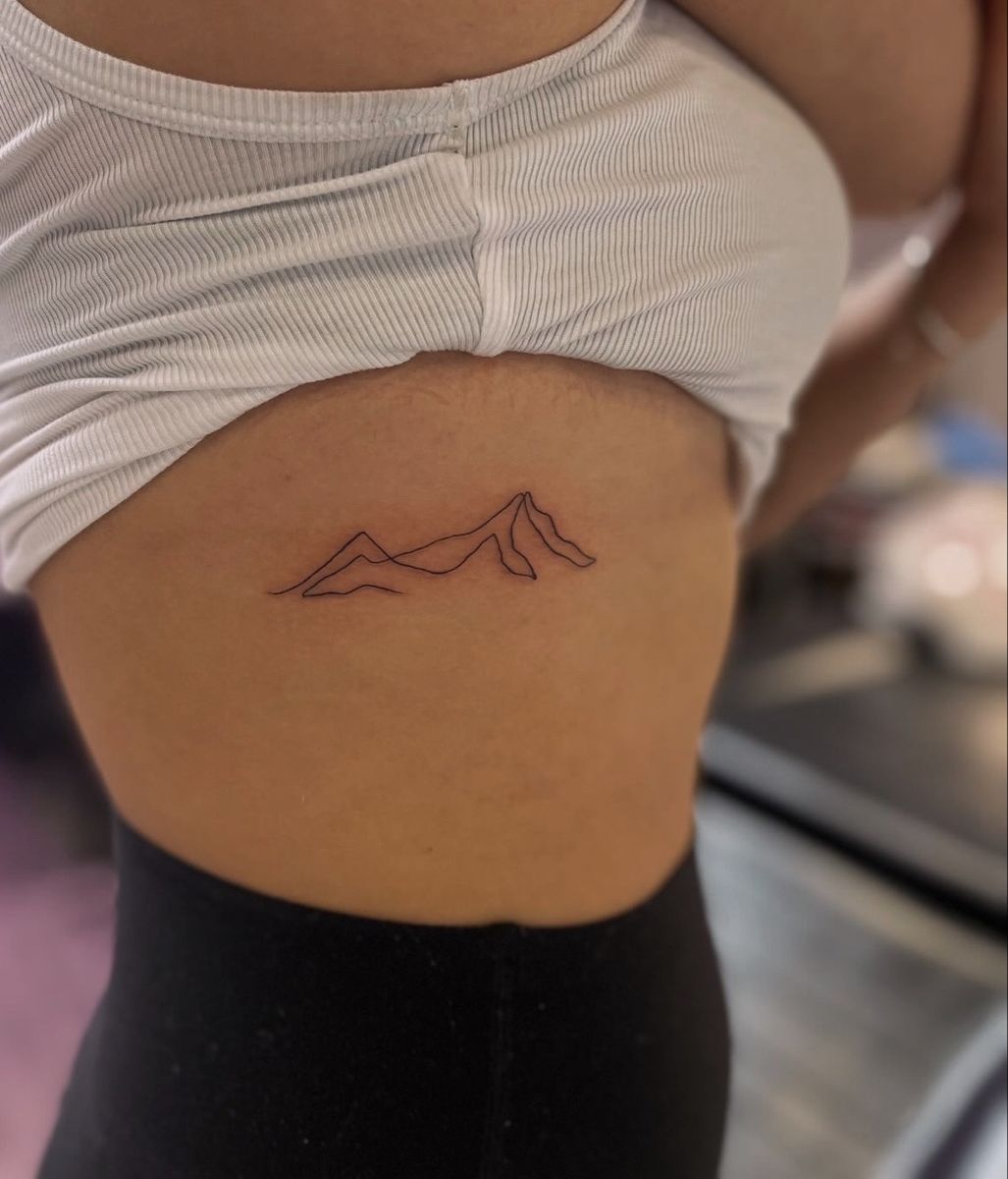 Fine-Line Rib Tattoo