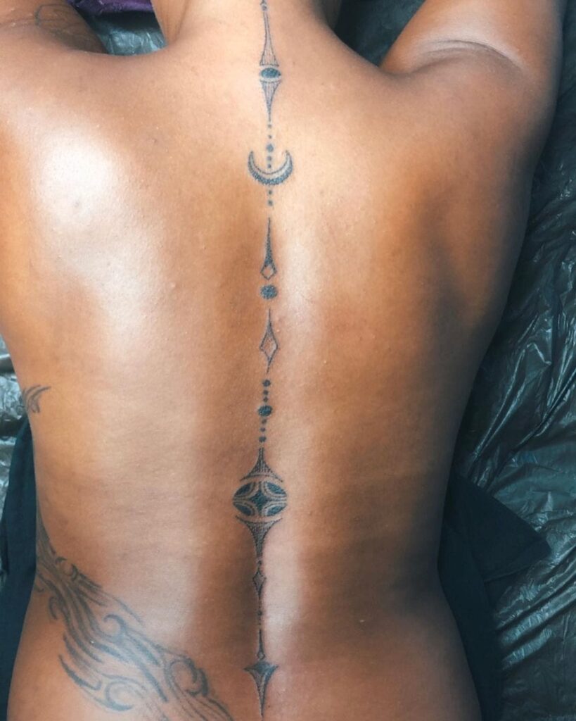 Geometric and Celestial Symbols Tattoo Spine Tattoos for Women