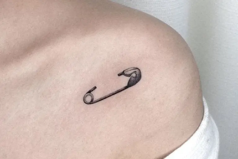 Elegant small chest tattoos featured design and collarbone placement