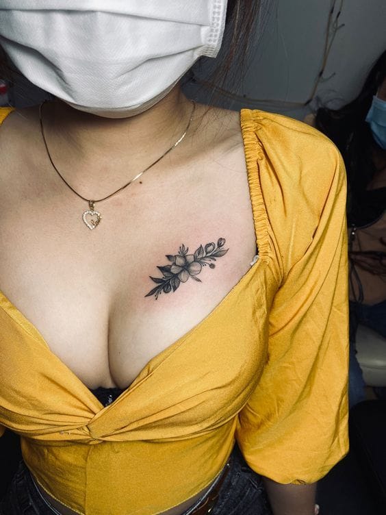 Symmetrical Sternum Floral Buds Tattoo Small Chest Tattoos