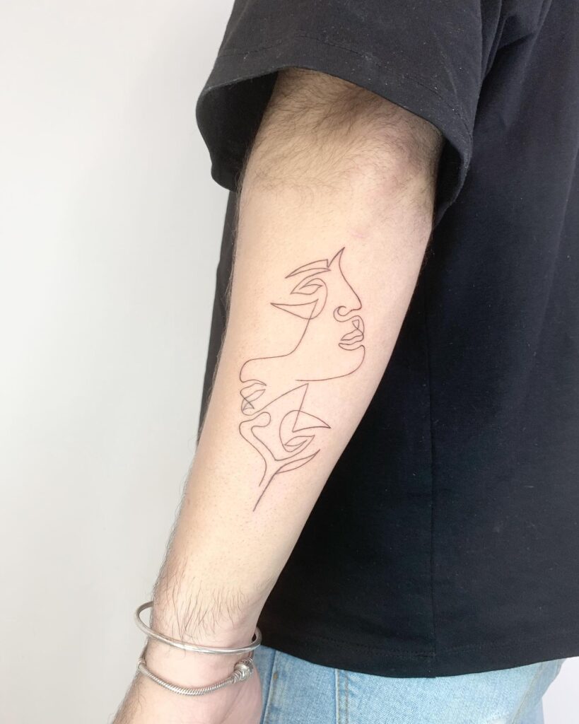 One line abstract face with flower tattoo