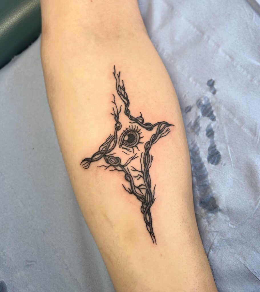 Abstract Eye Cross with Vines Tattoo cross tattoos for men tattoo