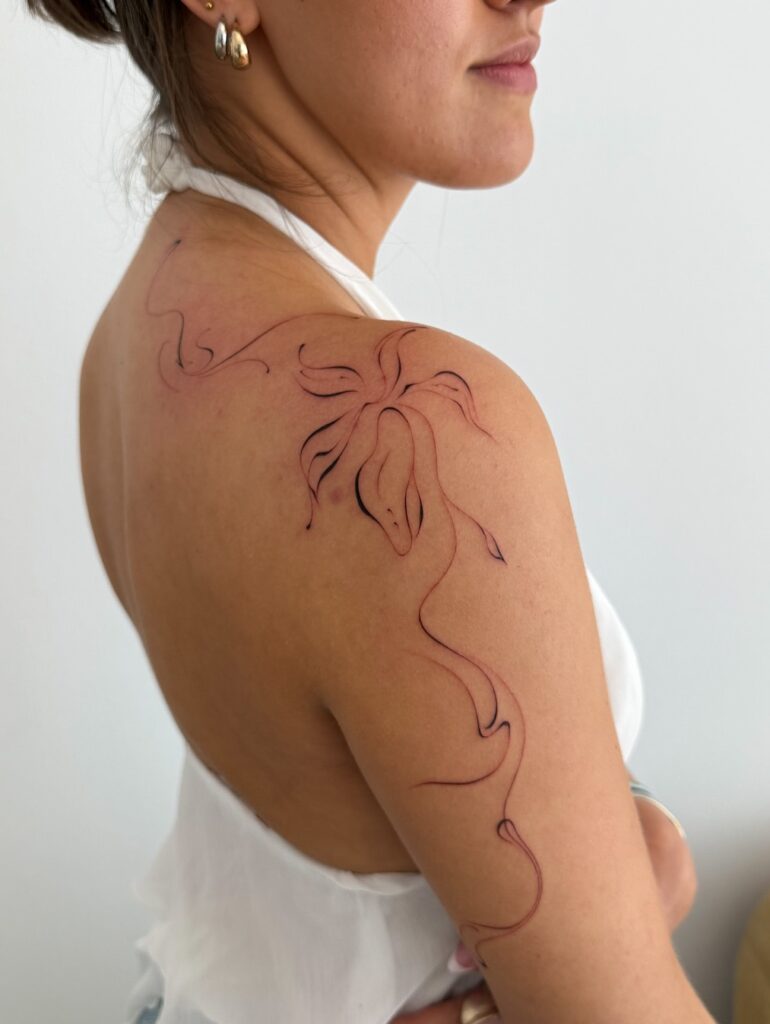 Abstract Fine Line Flower with Flowing Stems fine line tattoos for women tattoo