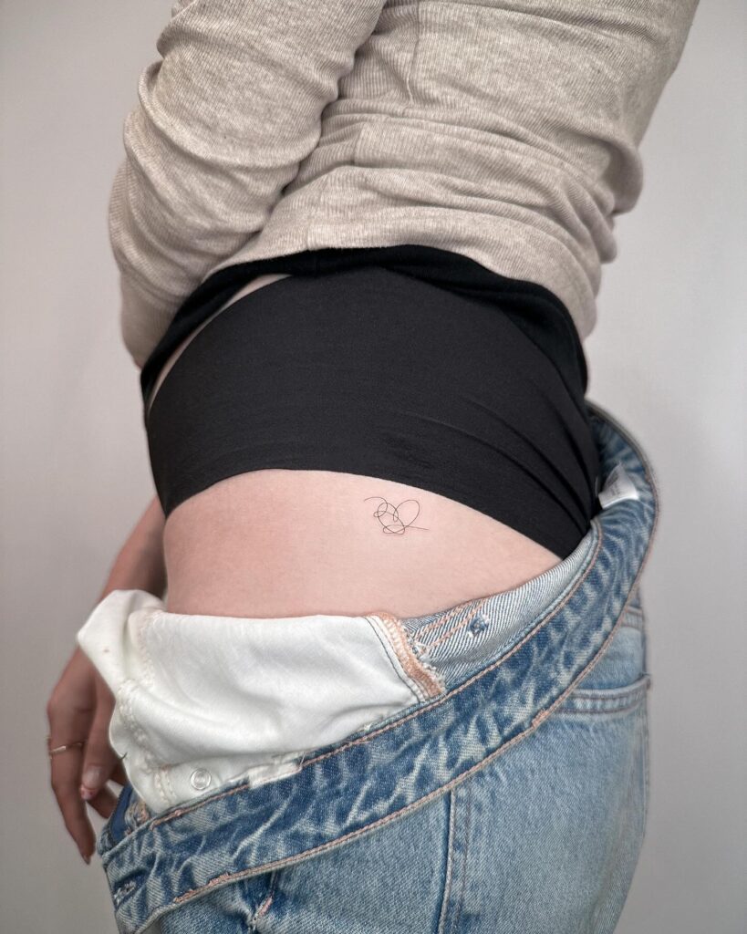 Abstract Line Art Hip Tattoo