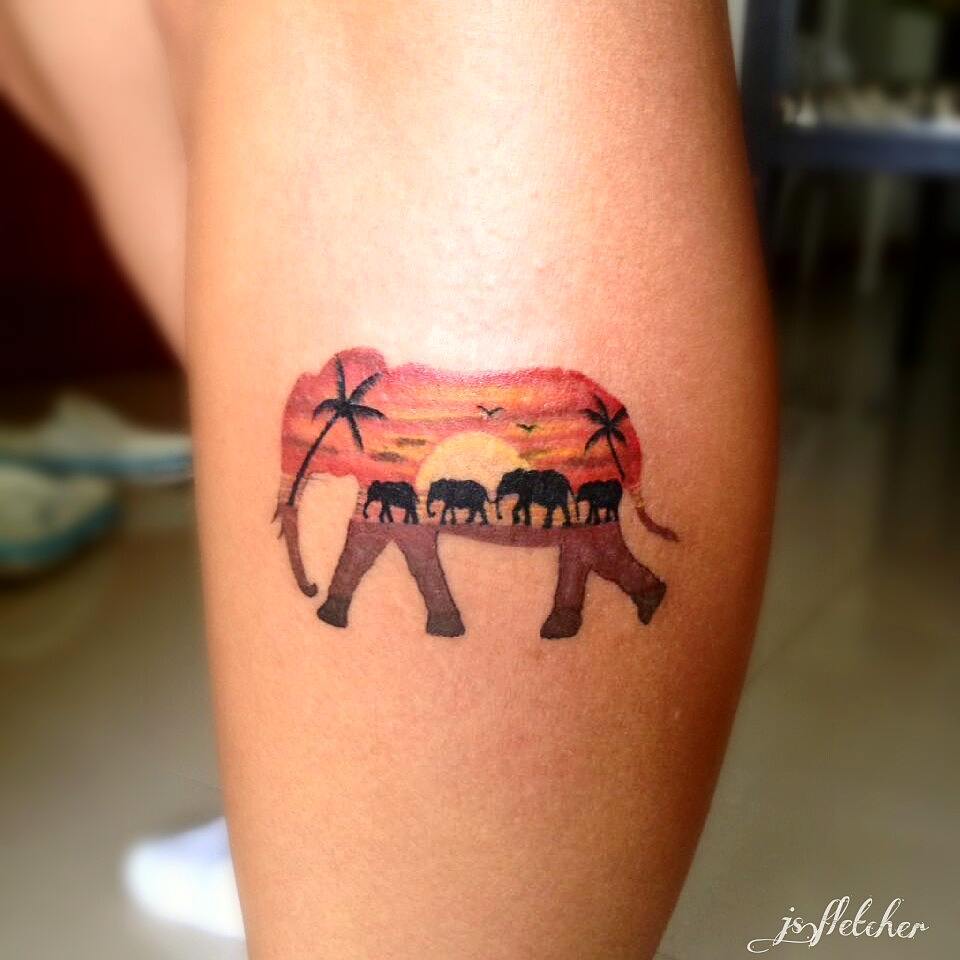 Sunset elephant silhouette tattoo