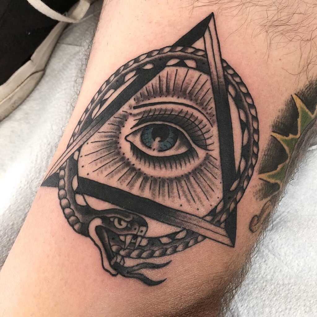 Spiked Ouroboros With Dark Detailing Tattoo Design