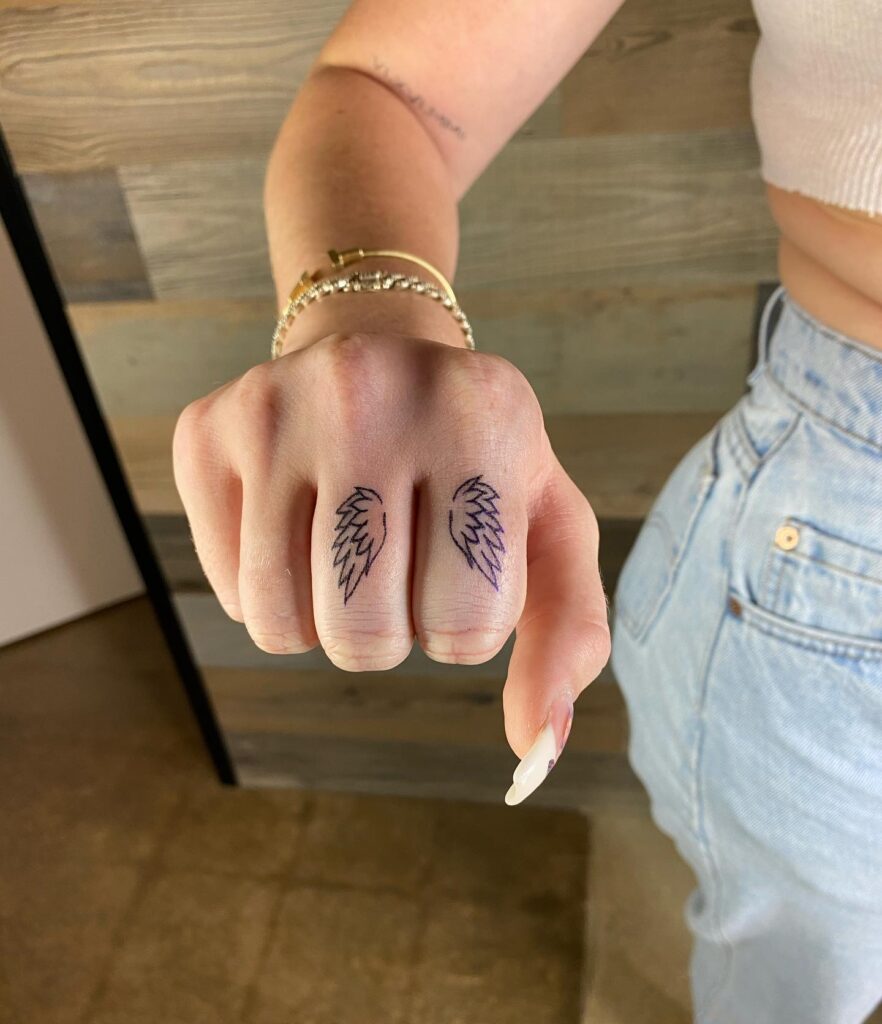 Sunflower Finger Tattoo