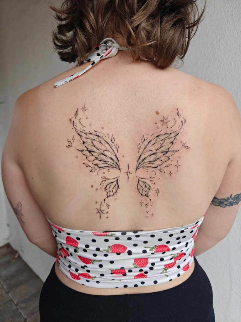 Symmetrical Butterflies Collarbone Tattoo
