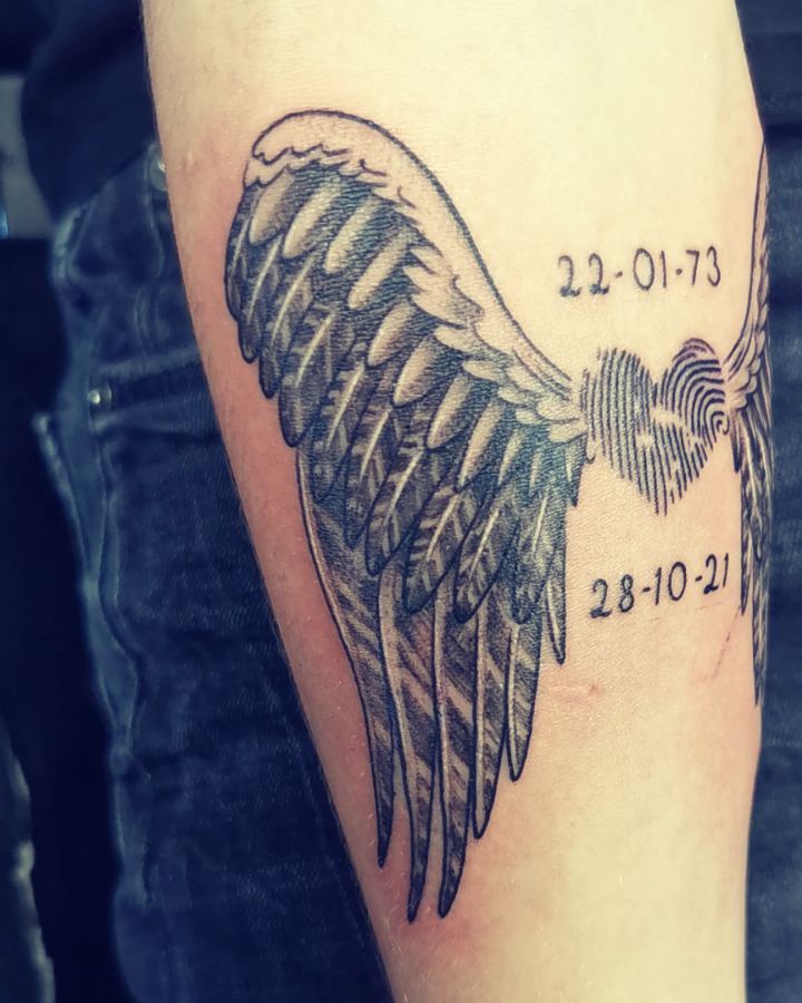 Couple’s Interlocking Fingerprint Heart Tattoo fingerprint tattoos tattoo