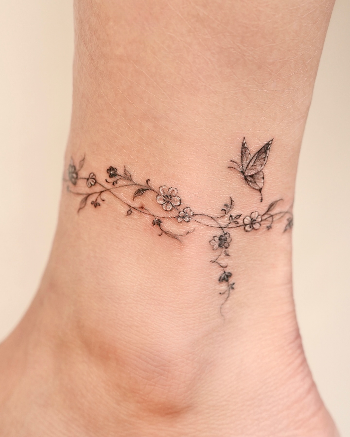 Butterfly And Floral Vine Anklet Tattoo