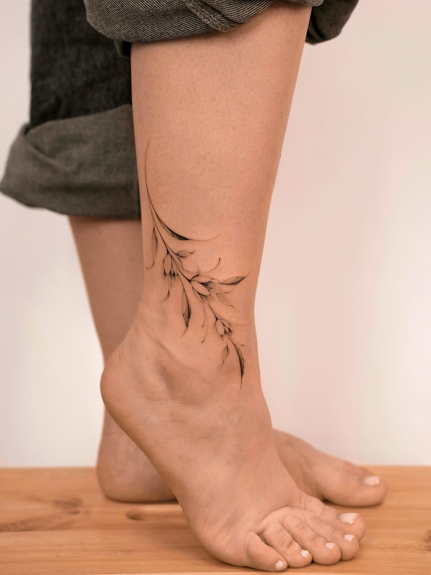 Minimalist Botanical Branch Ankle Tattoo