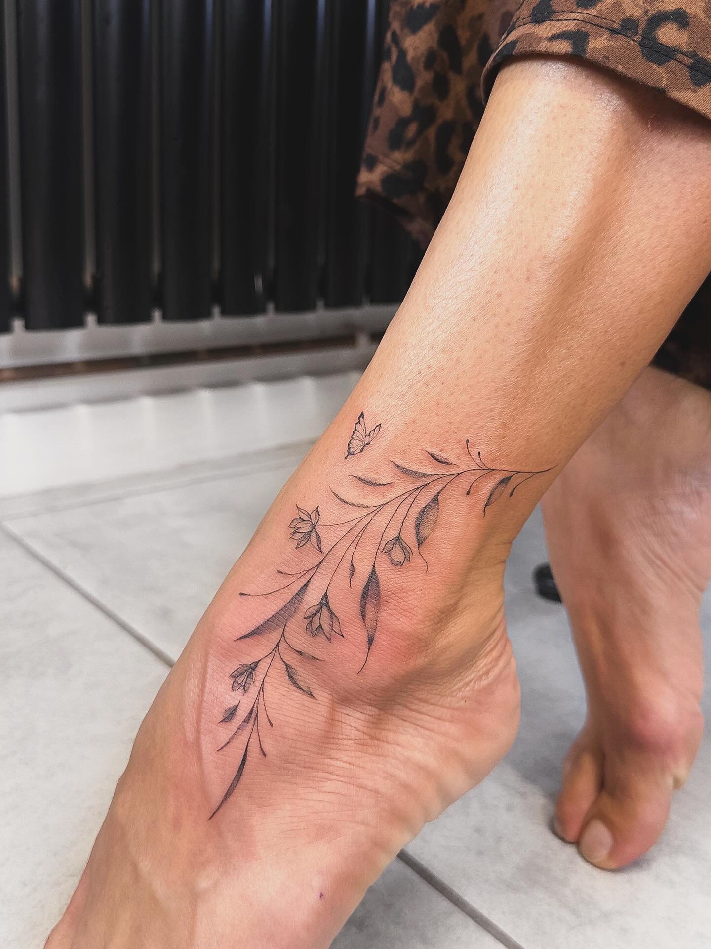 Wildflower Branch Ankle Tattoo