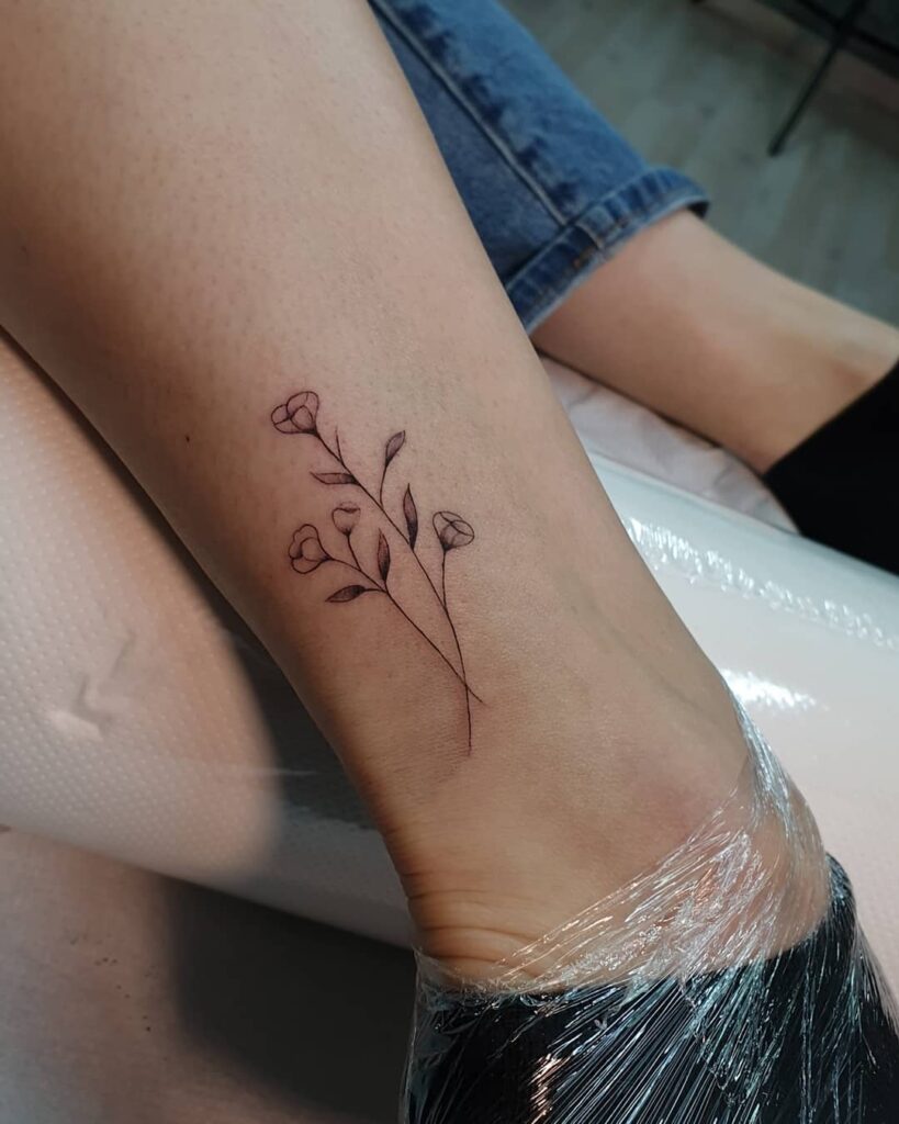 Ankle Wildflower Outline Tattoo minimal tiny flower tattoo ideas tattoo