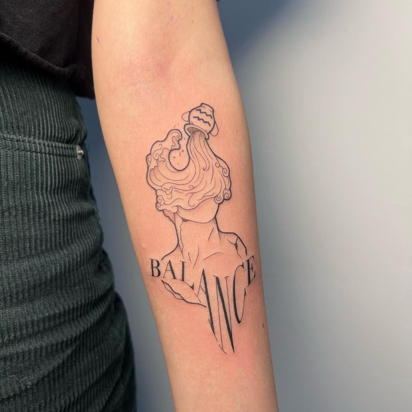Aquarius Balance Typography Tattoo