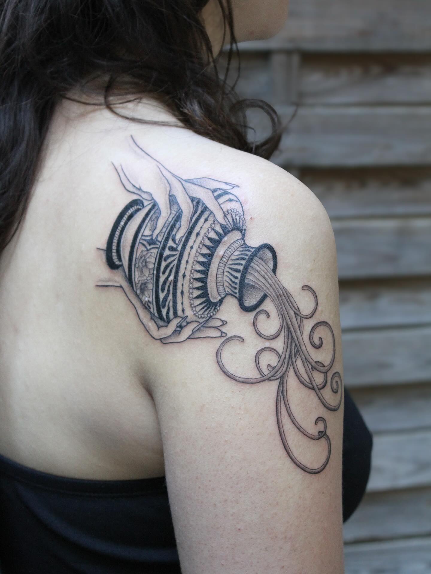 Aquarius Pouring Water Vessel Tattoo