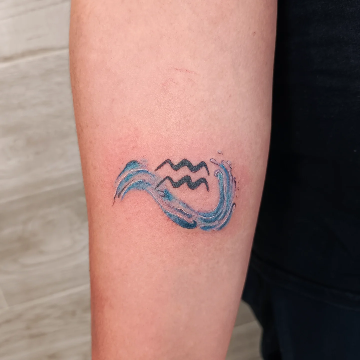 Aquarius Waves And Zodiac Symbol Tattoo