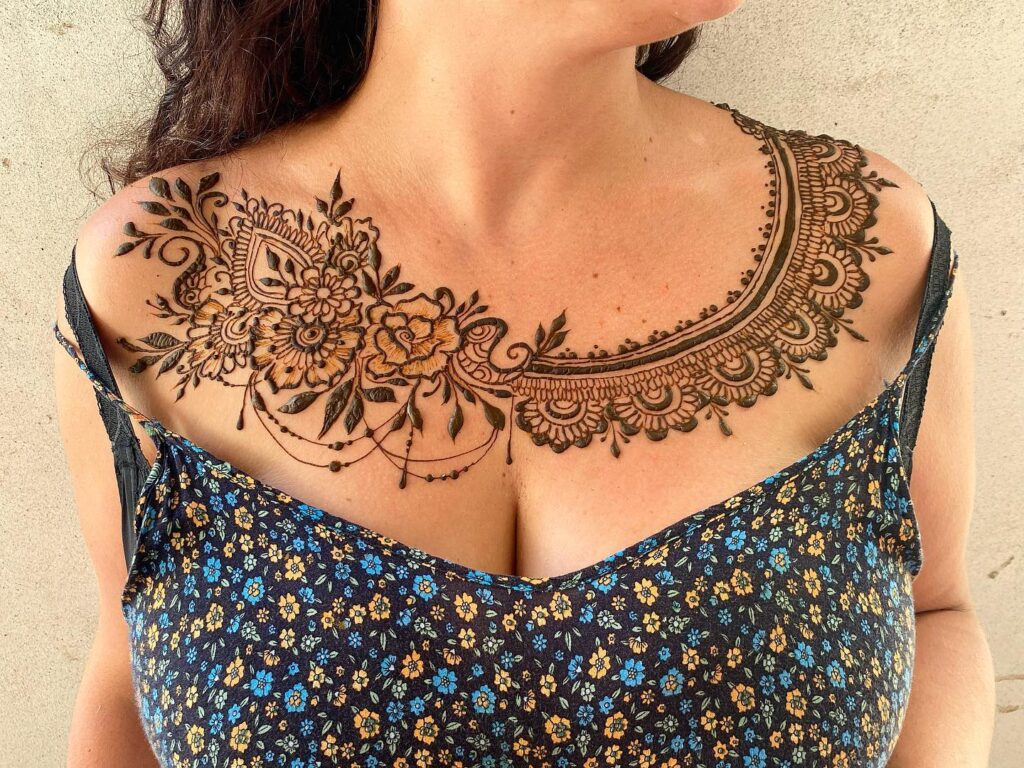 Tribal-Inspired Ornamental Collar Tattoo