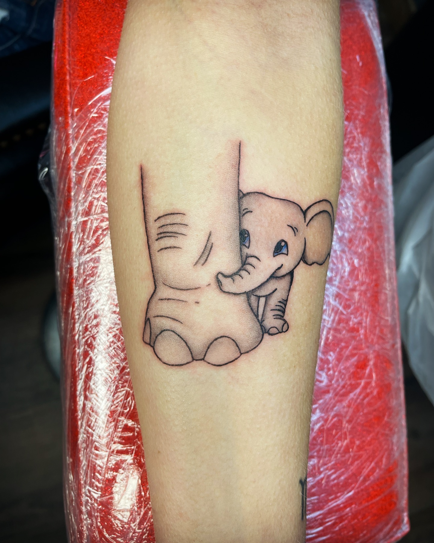 Baby Elephant Hiding Behind Parent Tattoo baby elephant tattoo ideas tattoo