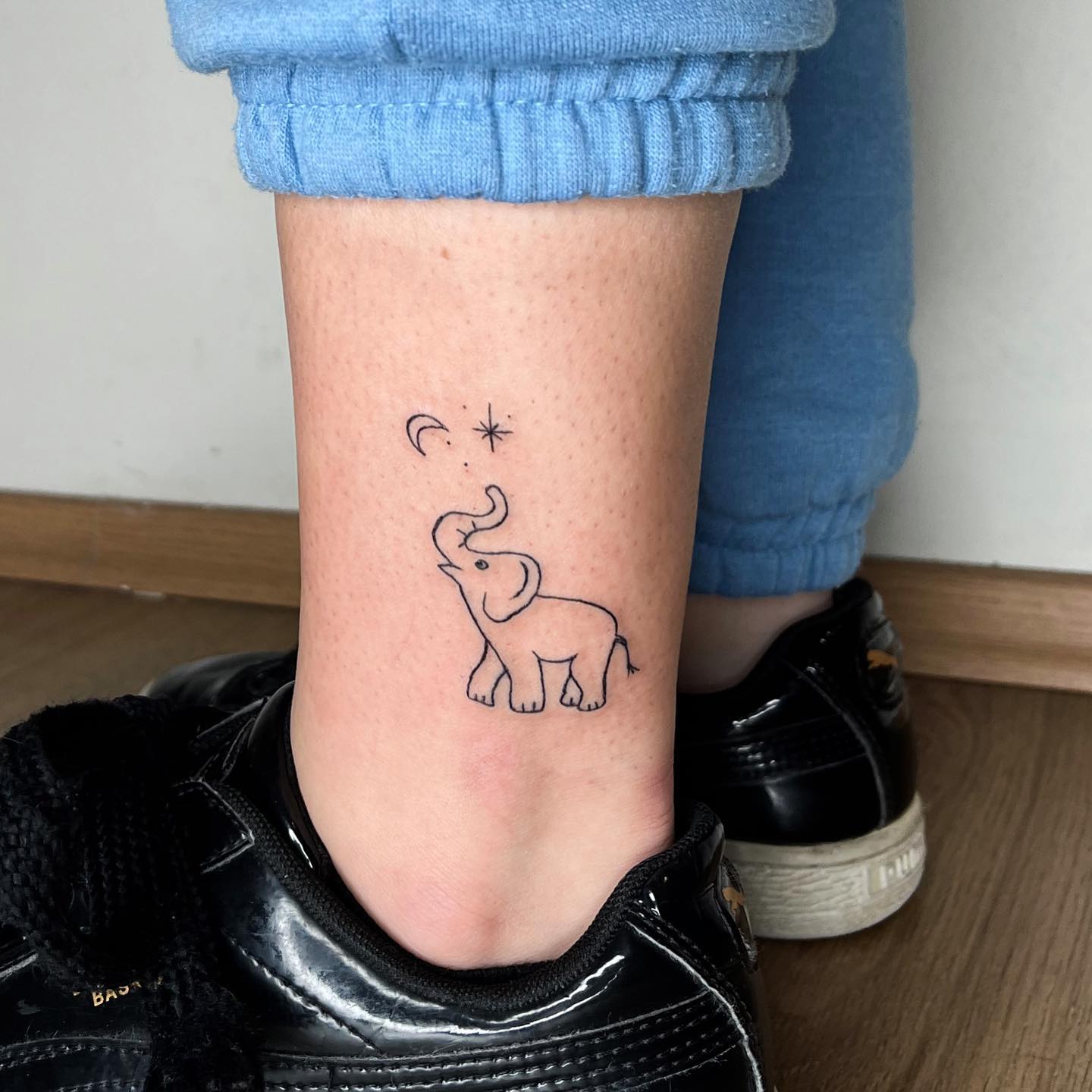 Baby Elephant With Moon and Star Tattoo baby elephant tattoo ideas tattoo