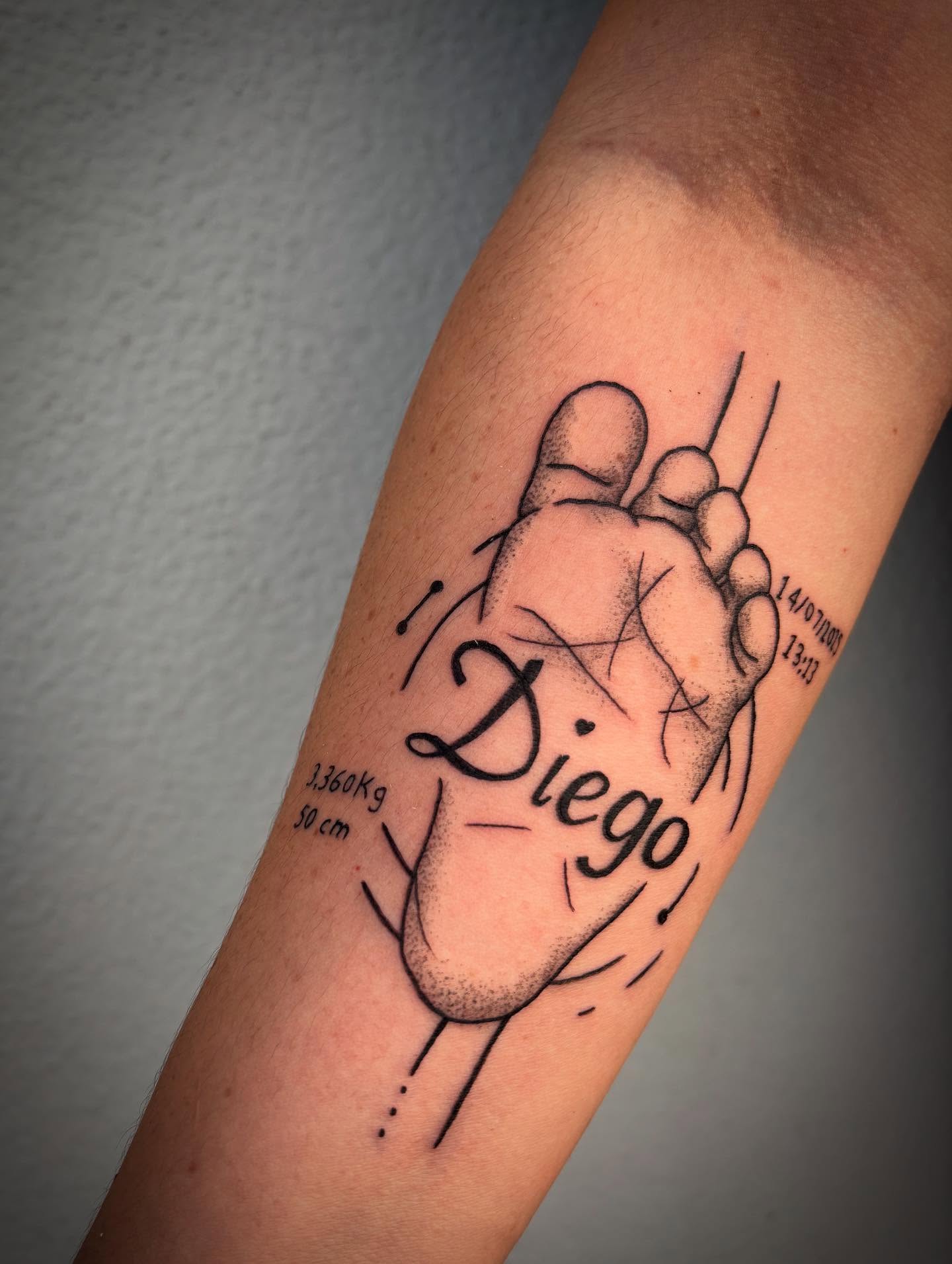 Baby Footprints With Pocket Watch Tattoo baby feet tattoos ideas tattoo