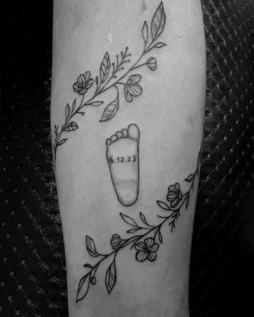 Baby Footprint with Floral Frame Tattoo baby feet tattoos tattoo