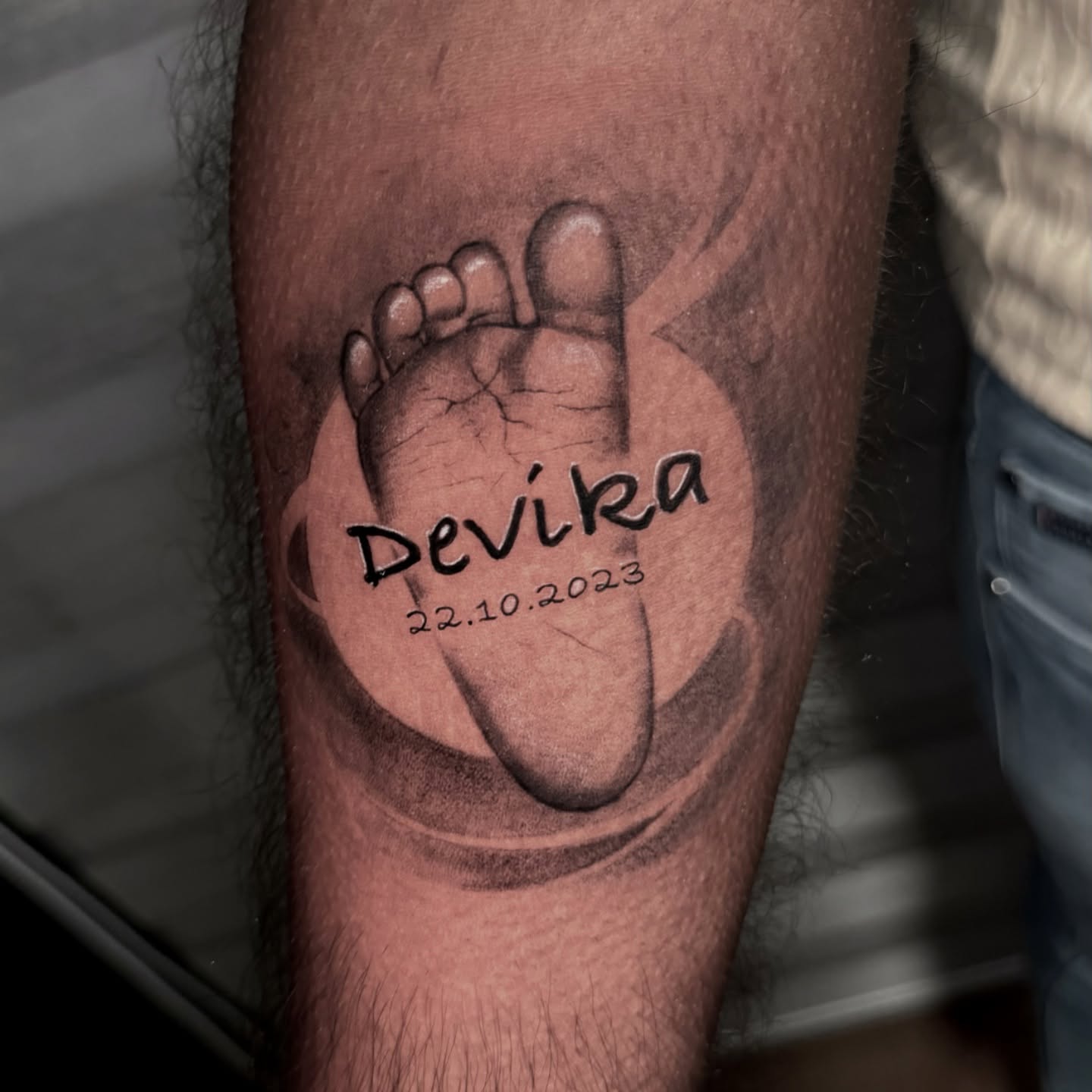 Minimalist Baby Footprint With Name Tattoo baby feet tattoos ideas tattoo