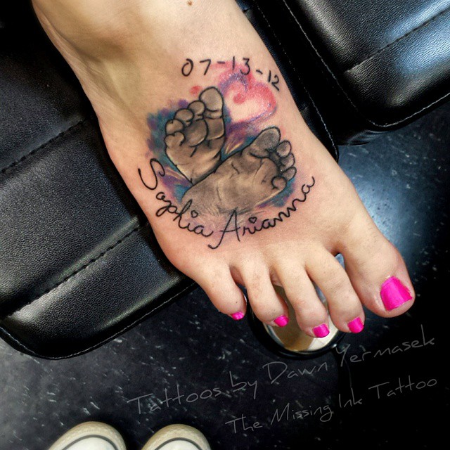 Baby Footprints Tattoo With Colorful Accents baby feet tattoos tattoo