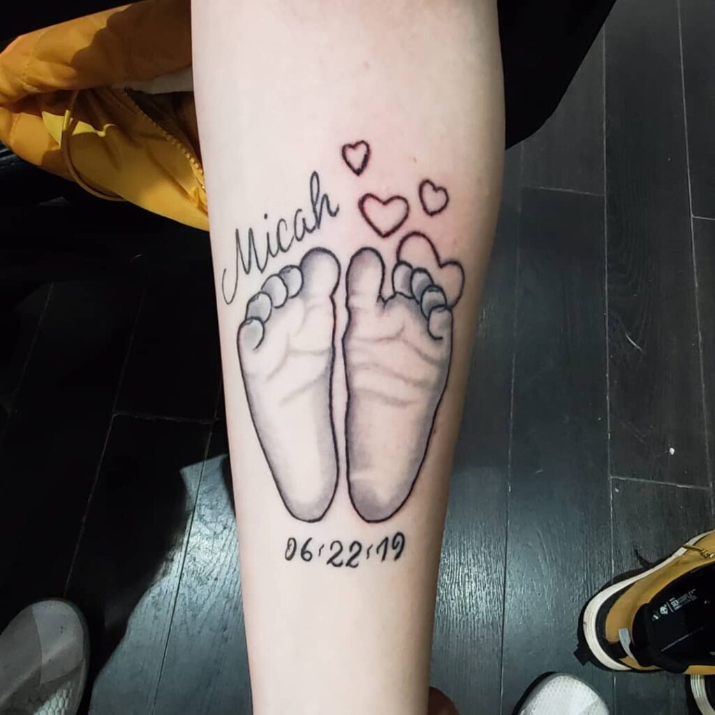 Baby Footprints with Heart Accents baby feet tattoos tattoo
