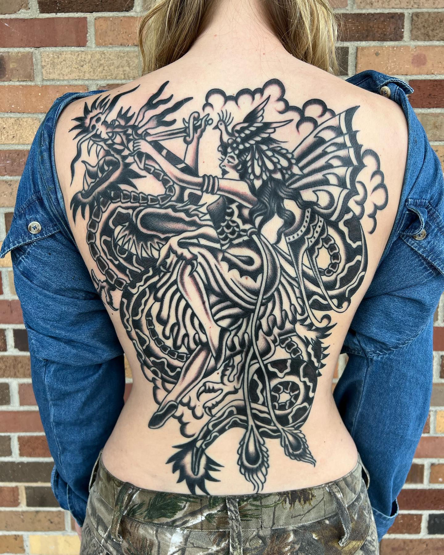 Fairy And Dragon Battle Back Tattoo