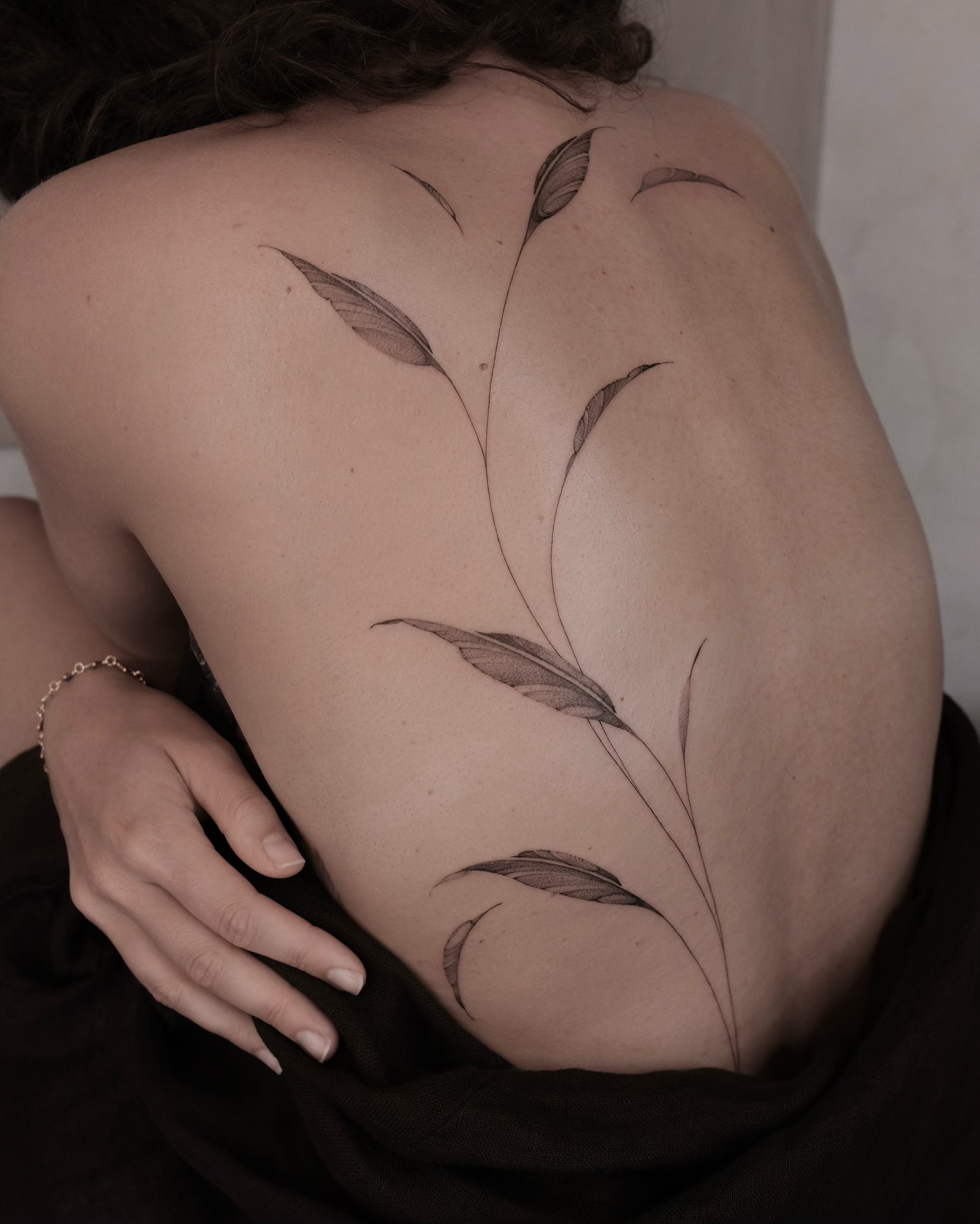Flowing Botanical Vine Back Tattoo
