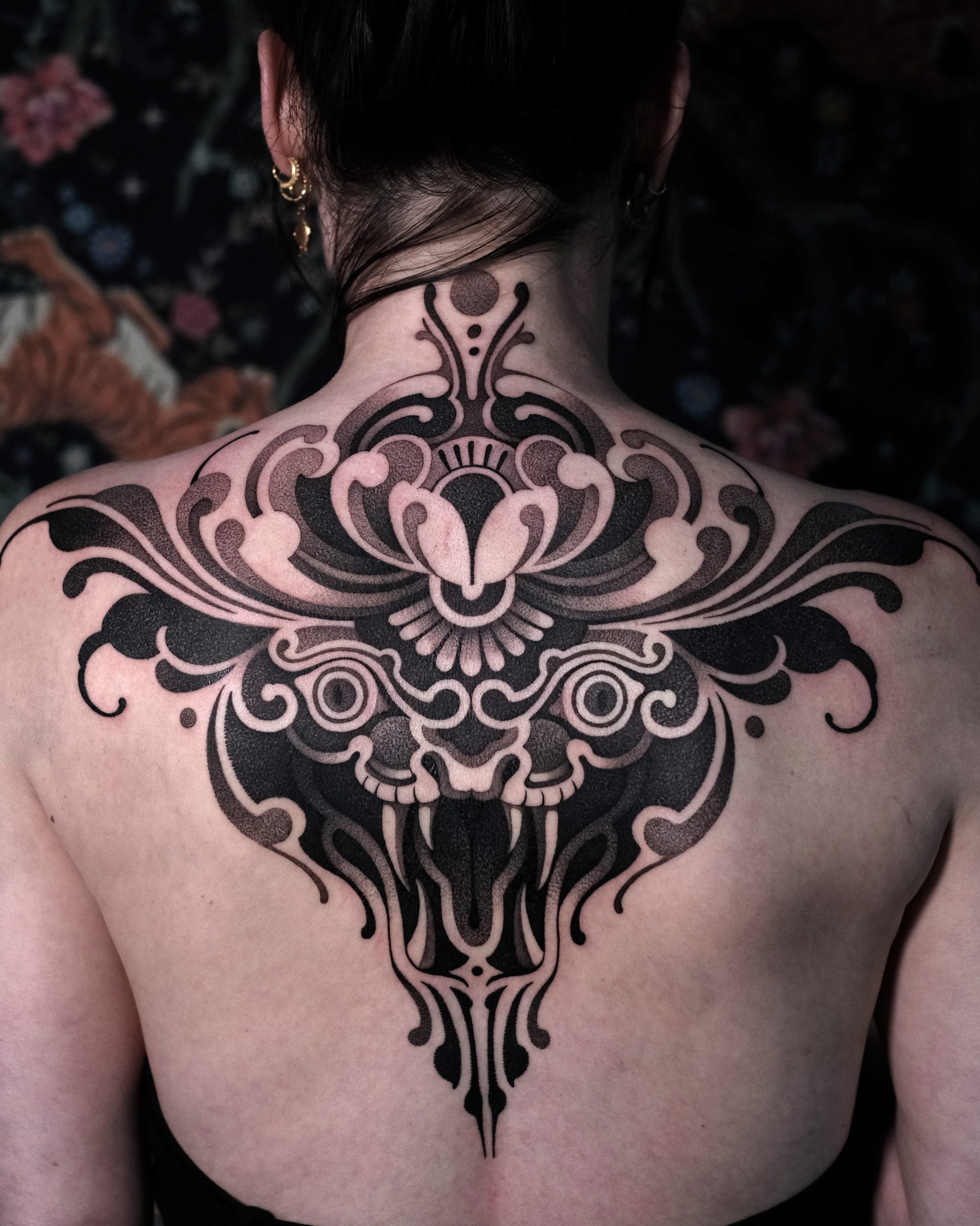 Ornamental Beast Mask Back Tattoo
