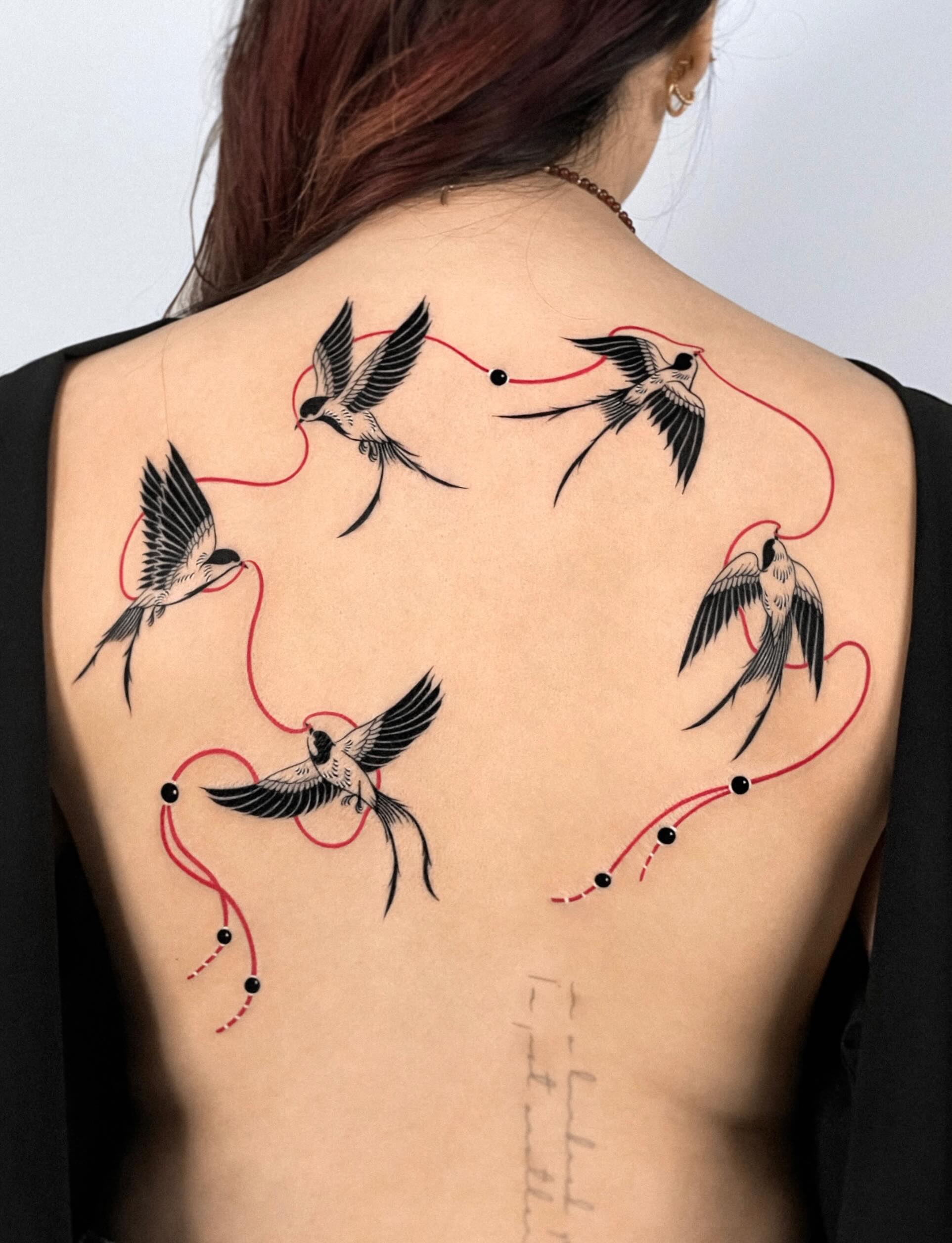 Swallows With Red Thread Back Tattoo