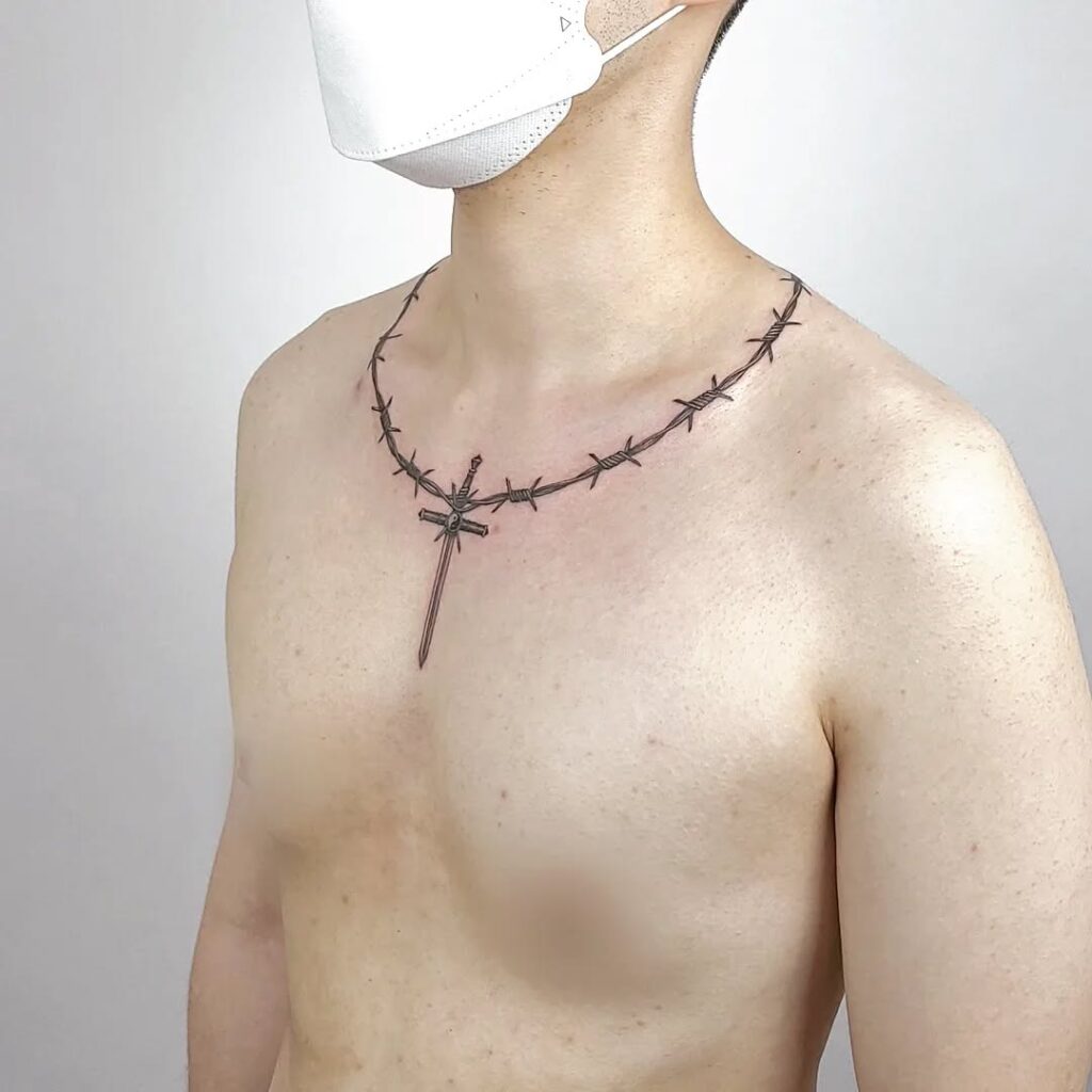 Beaded Chain With Wedding Rings Tattoo