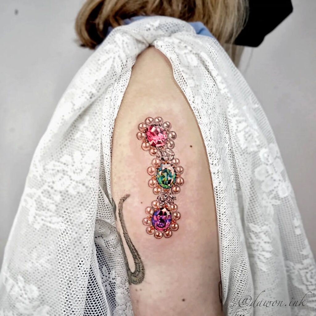 Realistic Teardrop Gem Tattoo