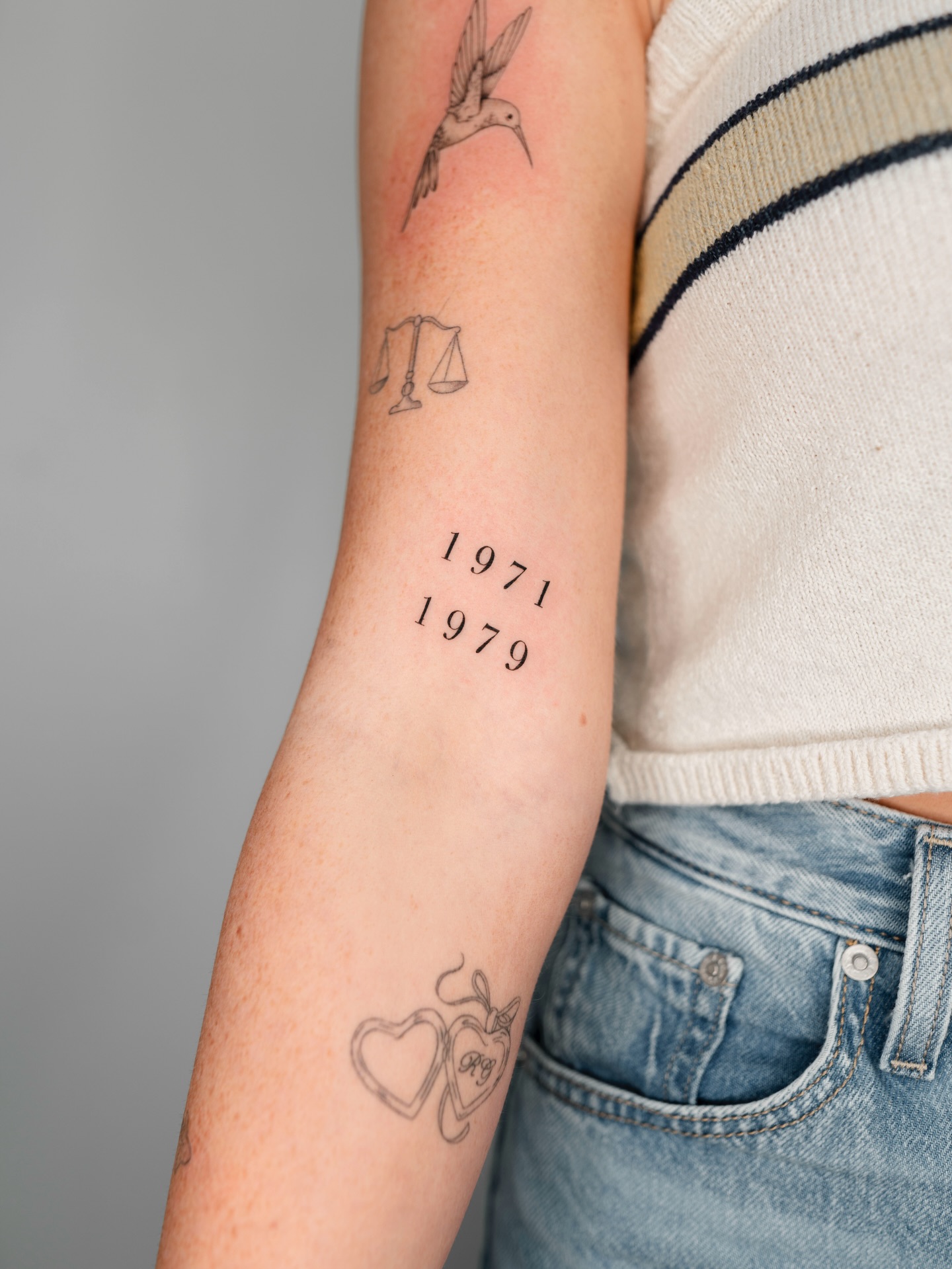 Meaningful Birth Year Number Bicep Tattoo