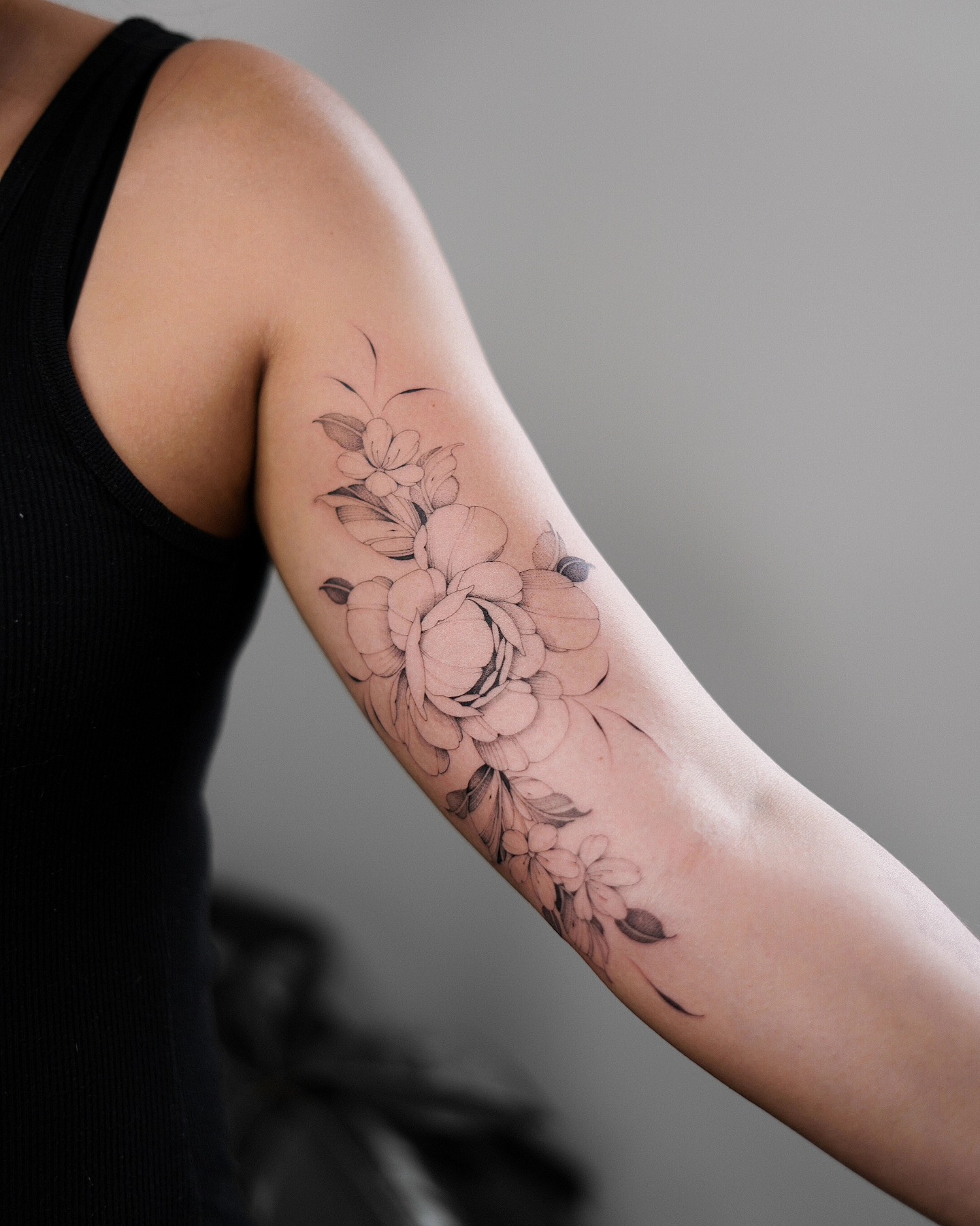 Peony And Blossom Bicep Tattoo