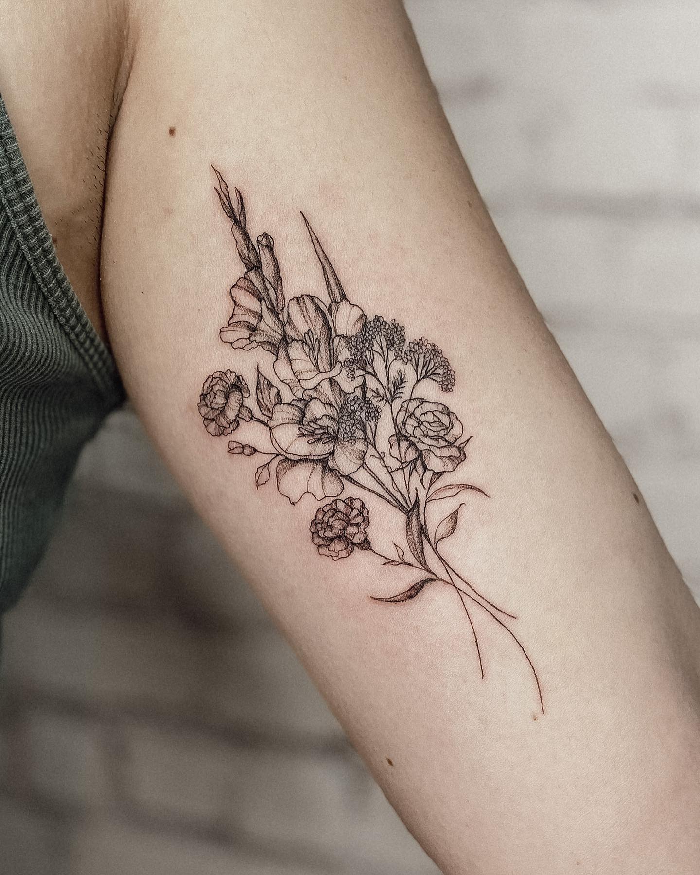 Wildflower Bouquet Bicep Tattoo