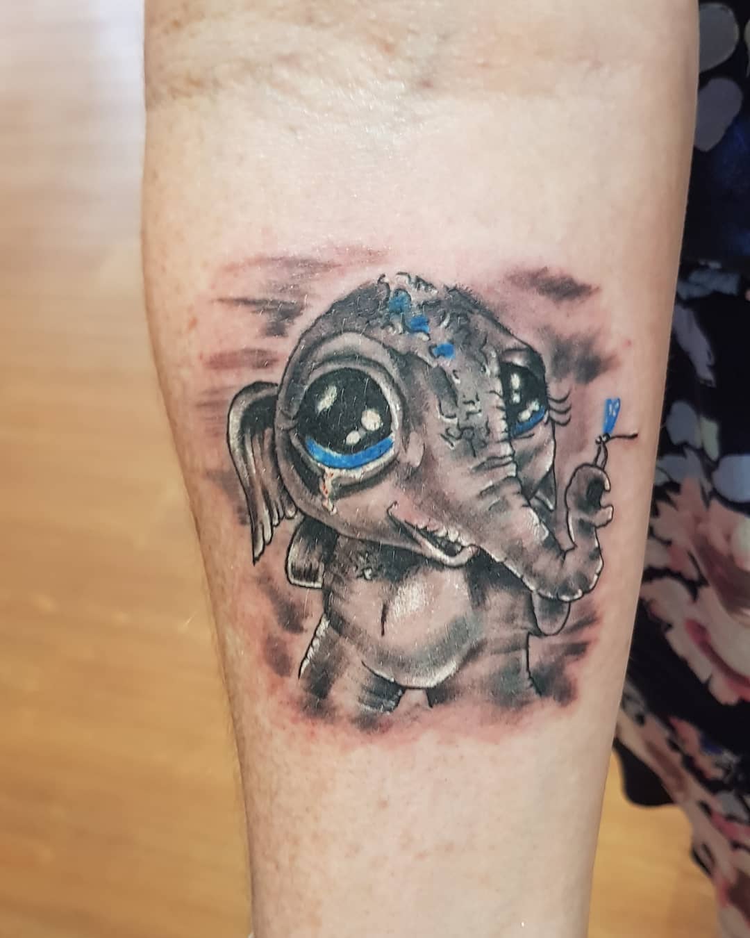 Big-Eyed Baby Elephant Tattoo baby elephant tattoo ideas tattoo