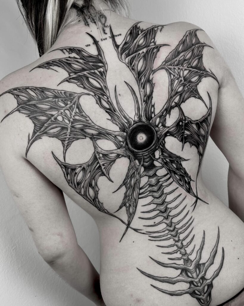 Bio-Mechanical Seraphim Spine Tattoo seraphim angel tattoo ideas tattoo