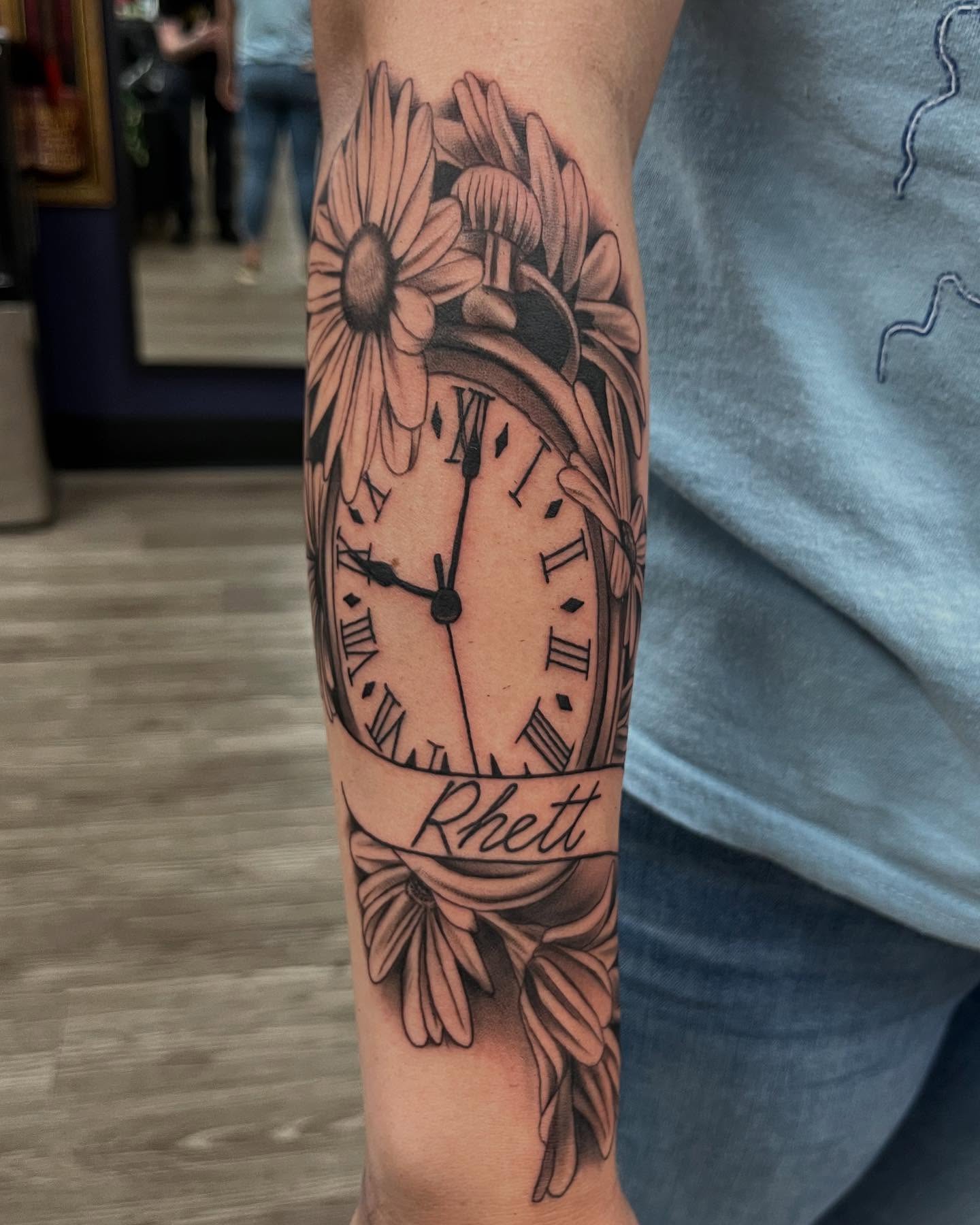 Birth Clock Tattoo With Mountains and Flowers birth clock tattoos tattoo