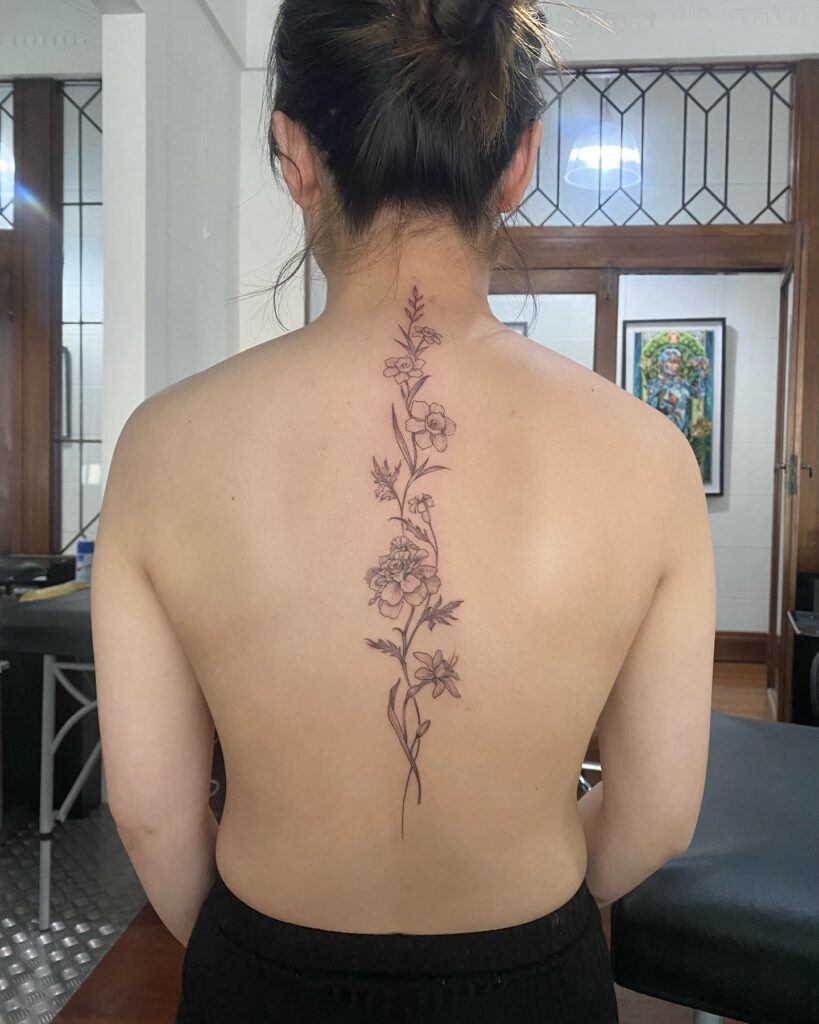 Celestial Geometric Spine Tattoo