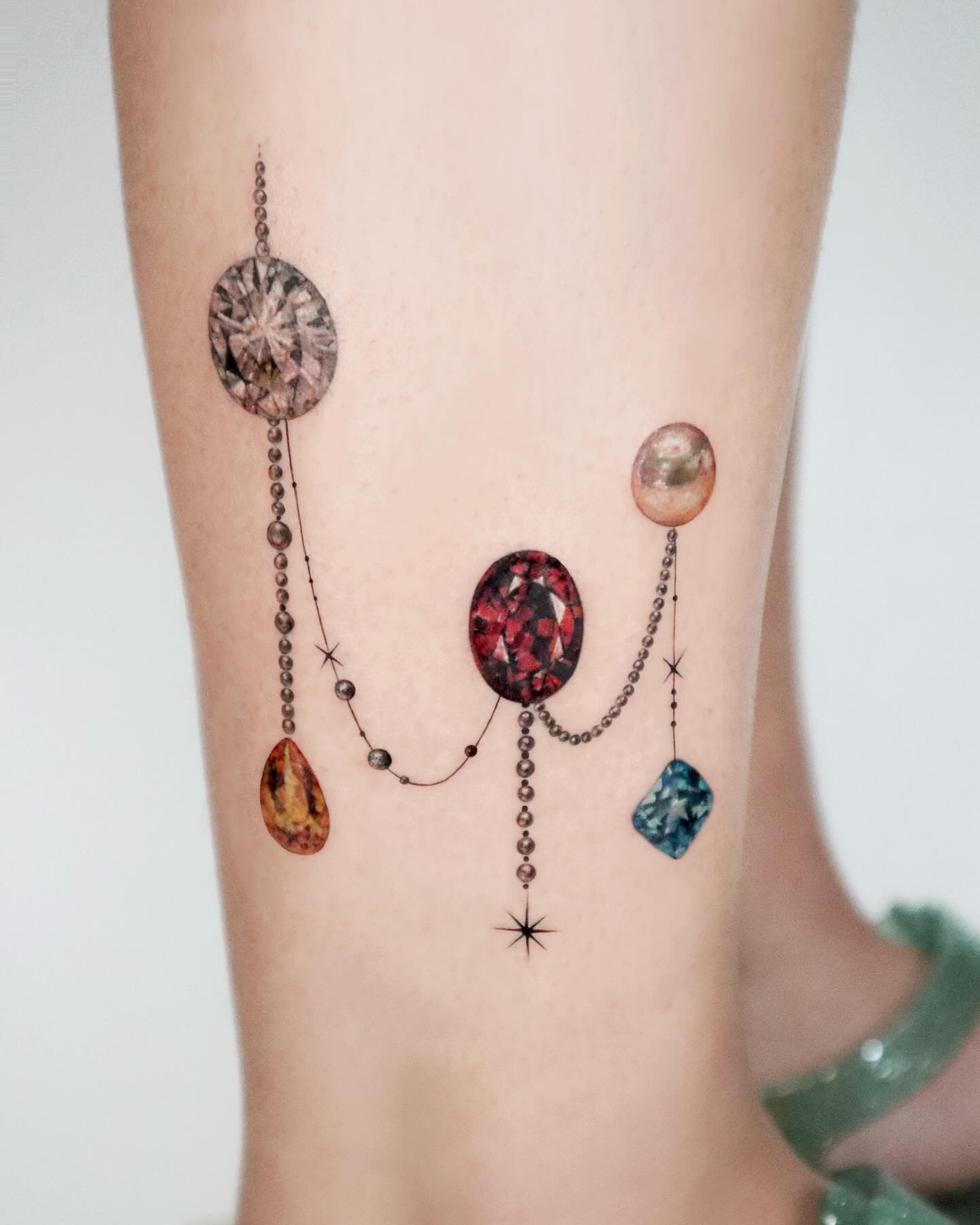 Celestial Birthstone Garland Tattoo
