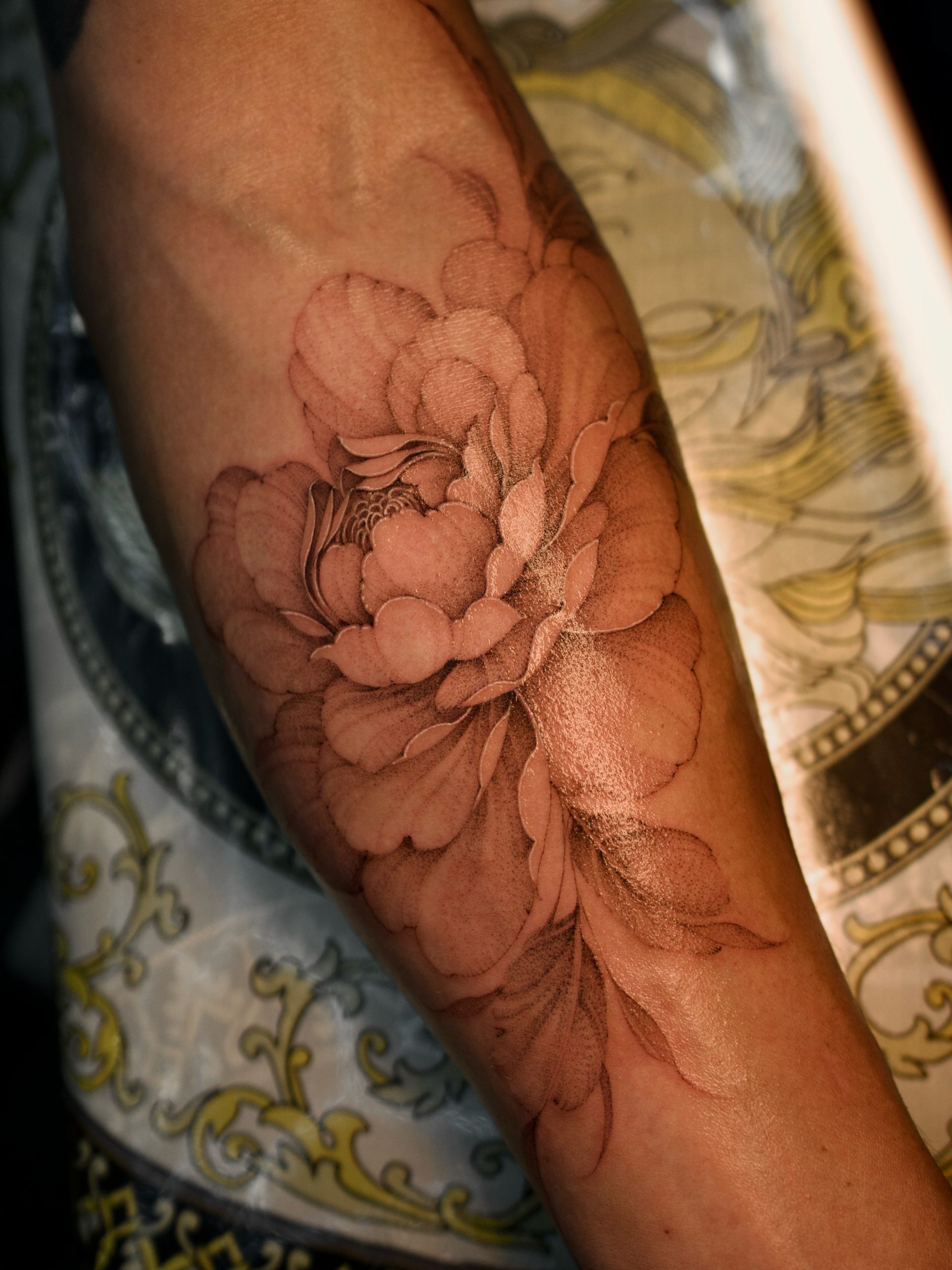 Black and Gray Peony Forearm Tattoo peony tattoos ideas tattoo