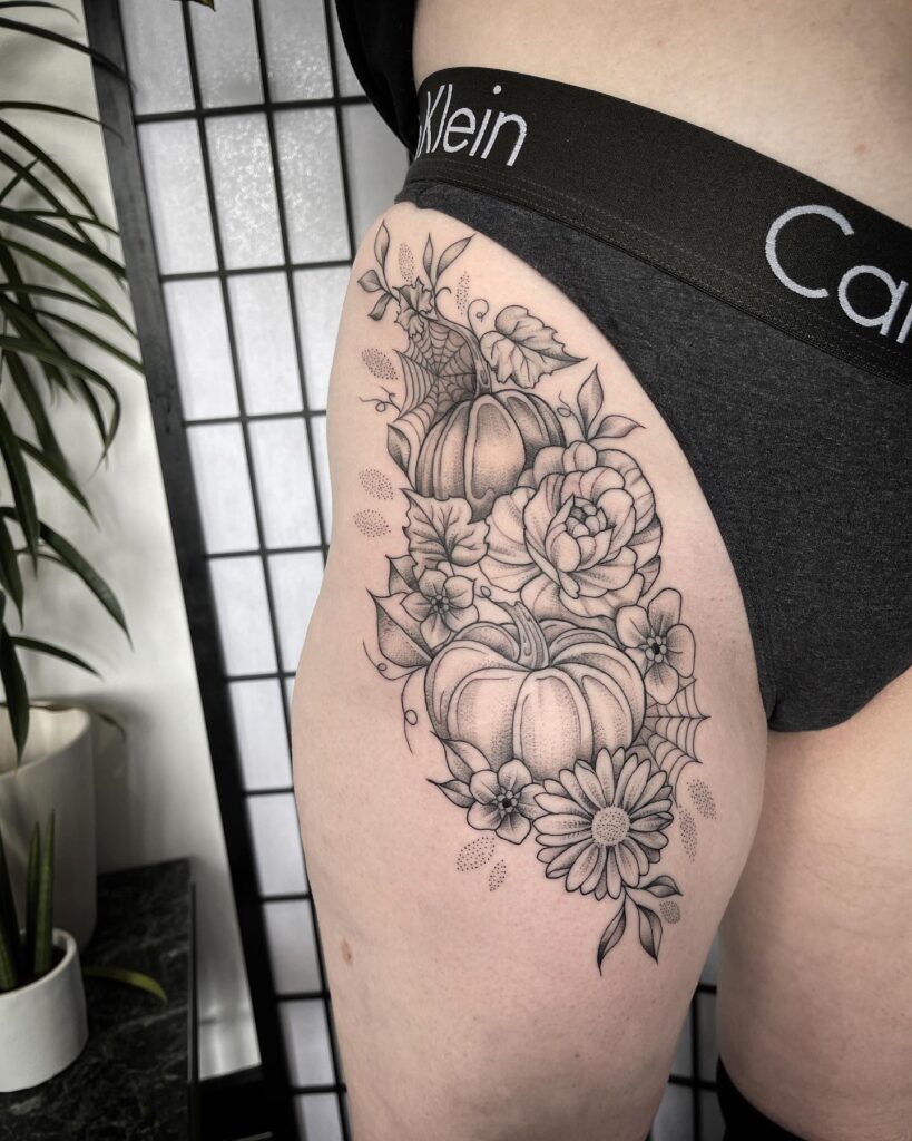 Colorful Jack-O -Lantern And Flower Tattoo