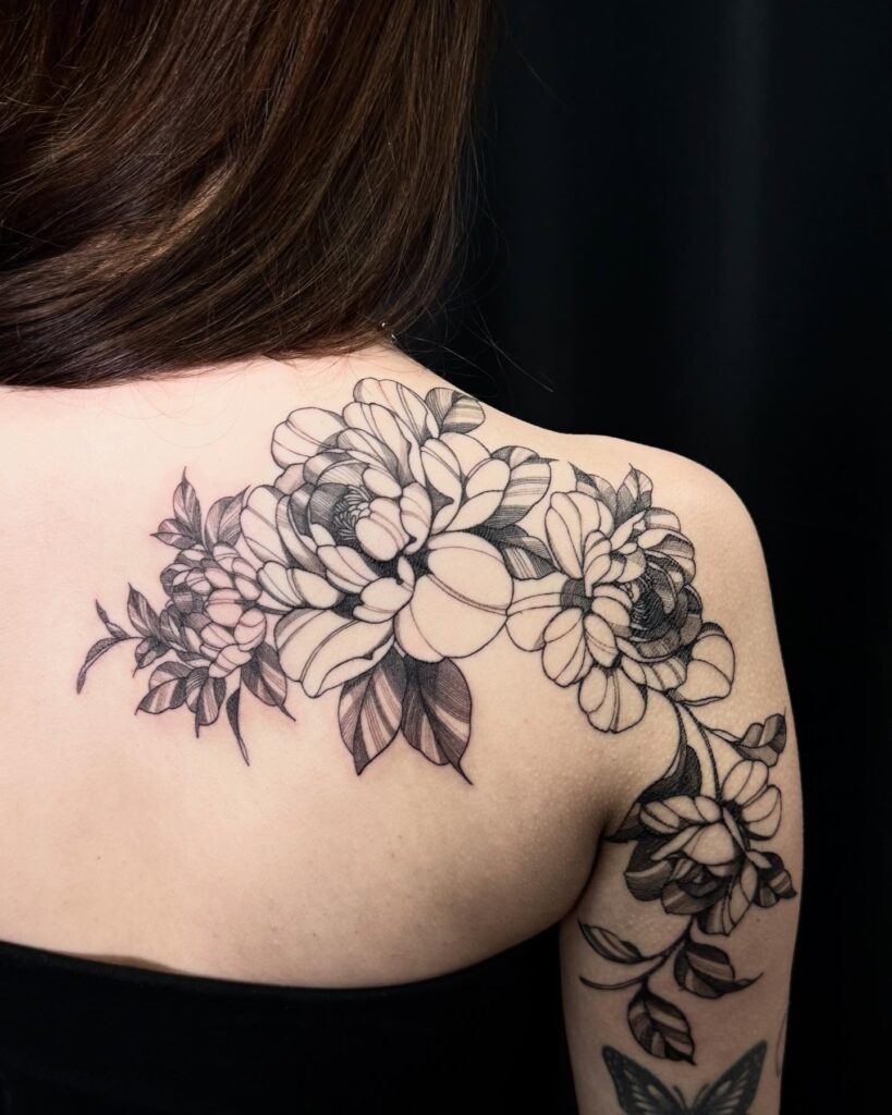 Black and Grey Floral Wrap Shoulder Tattoo women shoulder flower tattoo ideas tattoo