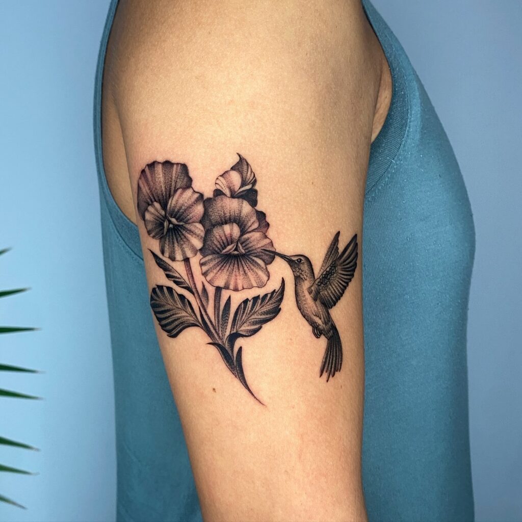 Black and Grey Hummingbird with Blooming Florals hummingbird tattoos tattoo