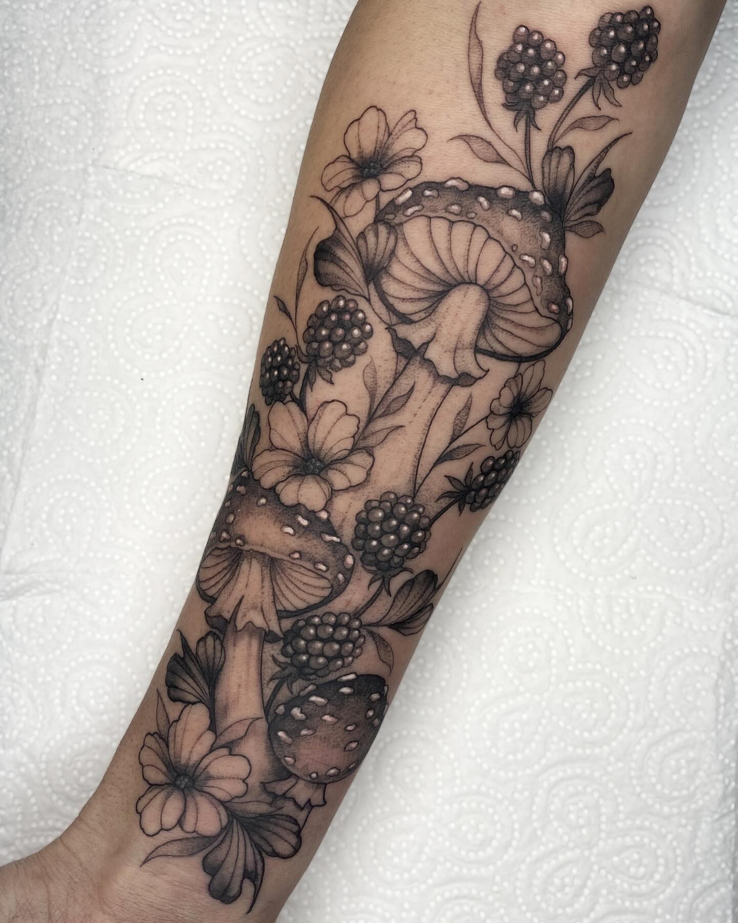 Surreal Mushroom Tattoo with Eyes and Dripping Details mushroom tattoo ideas tattoo