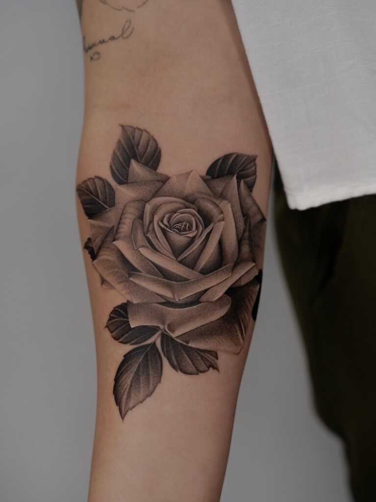 Black and Grey Realistic Rose Tattoo on Arm rose tattoos for women tattoo