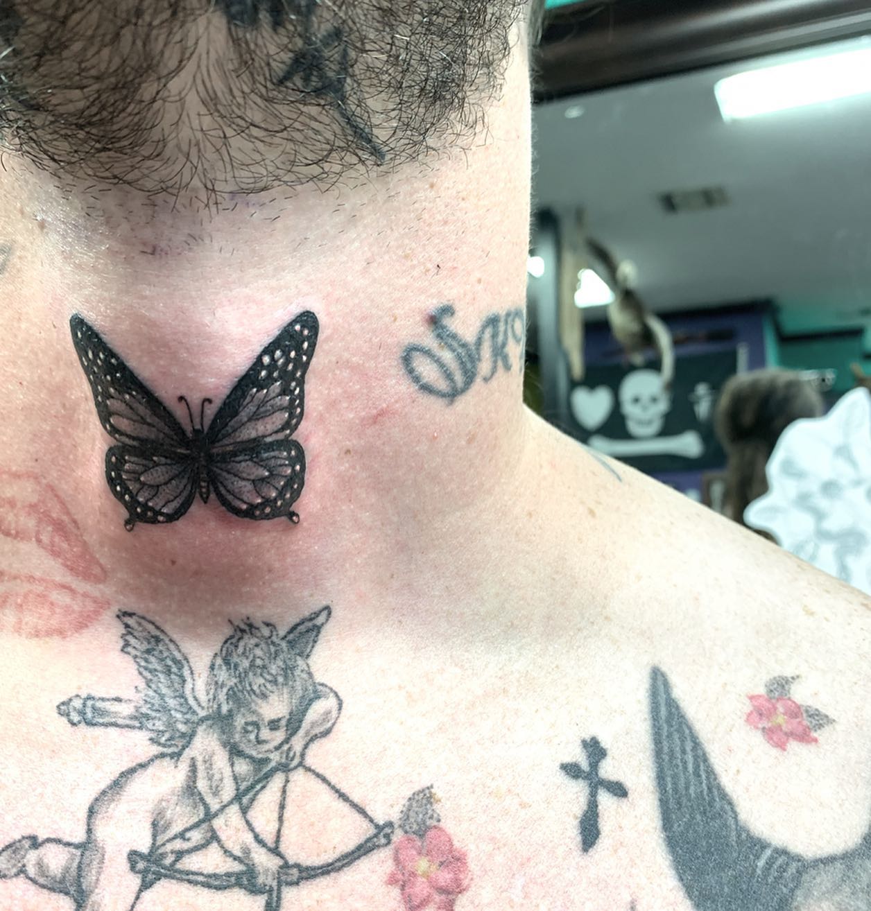 Black Butterfly Neck Tattoo